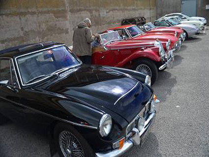 Classic cars and motor vehciles attending motor rallies in the UK